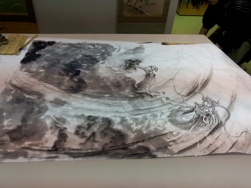 Peinture à l'encre de Chine réalisée par Tsutomu Hirao à Japan Expo