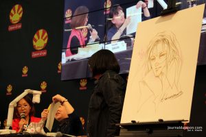 Harumo Sanazakin dessinant lors de la conférence