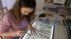 Delphine au travail sur le volume 2