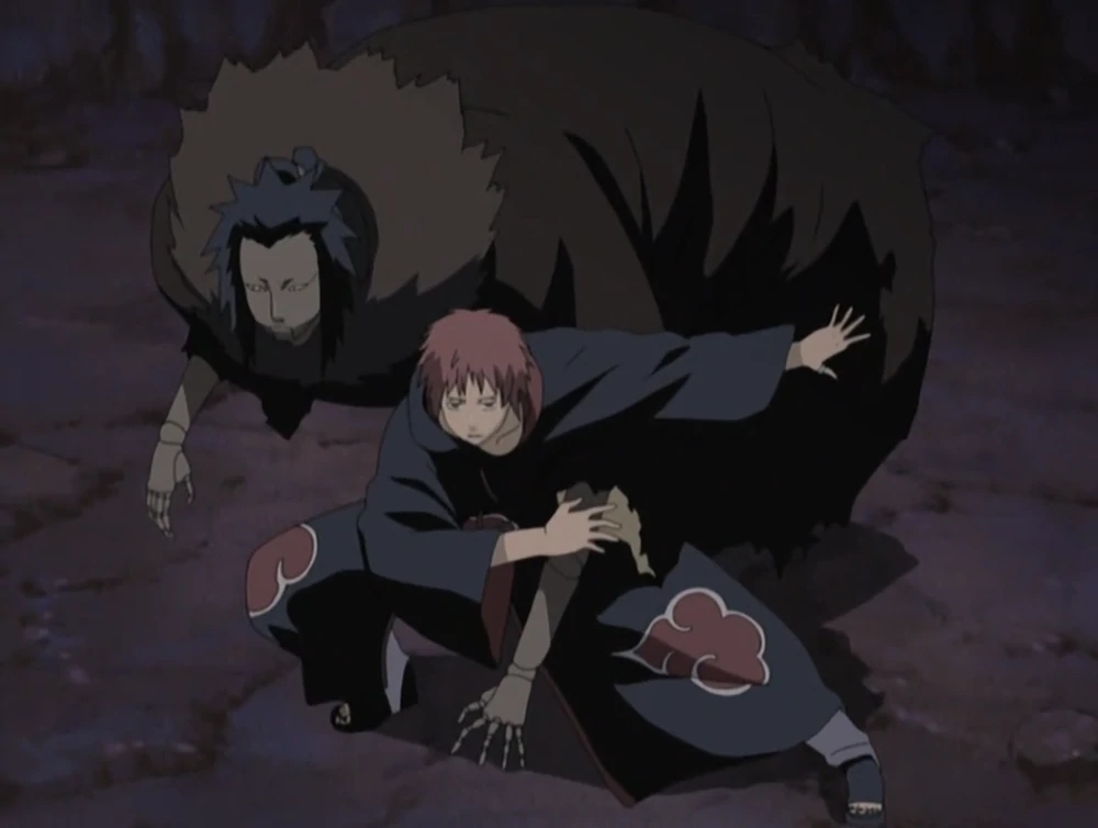 Sasori utilisant la marionnette du Troisième Kazekage