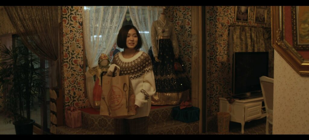 Maison d'Aoi avec robe traditionnelle coréenne en fond