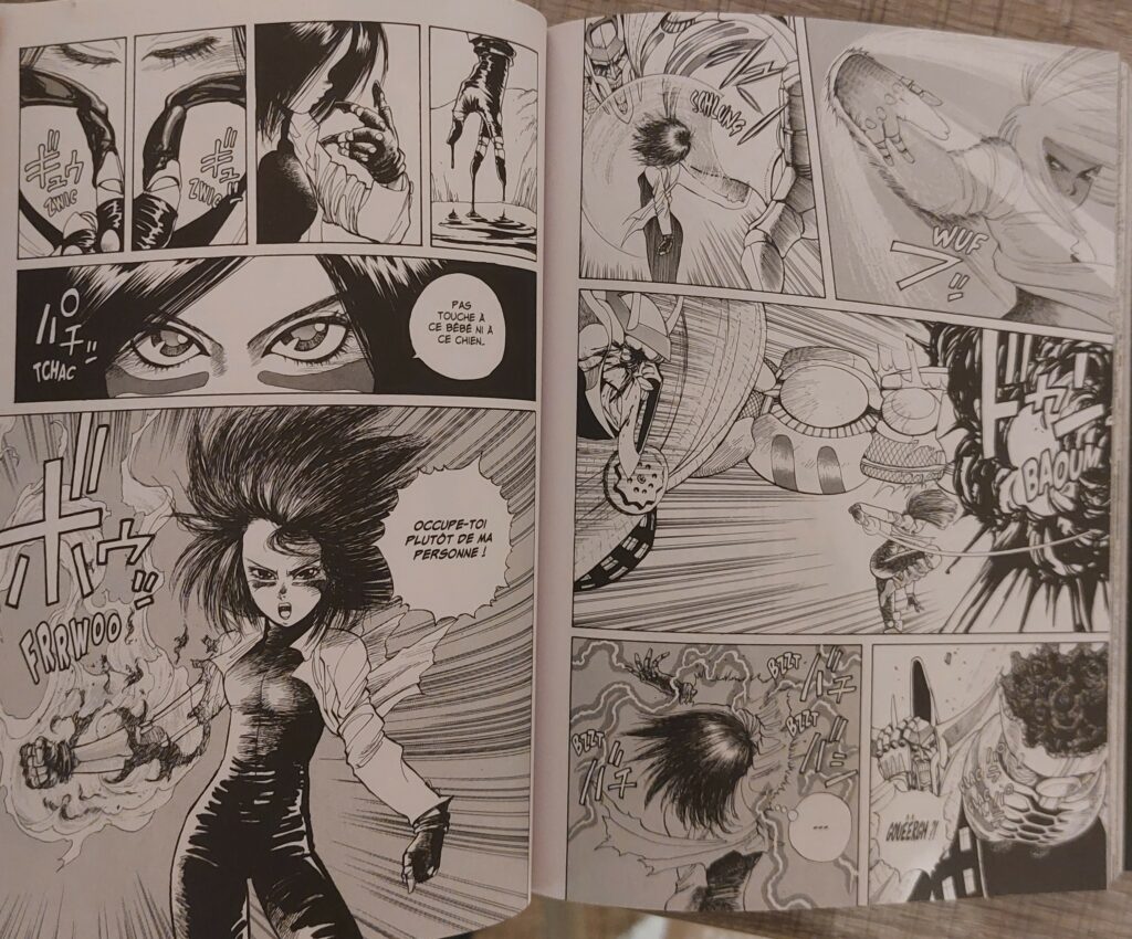 Gally en mode combat contre le cyborg Zapan dans les bas-fond de la décharge. Dans Gunnm, chez Glénat