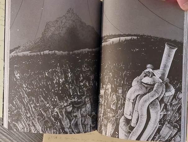 Gally scrute la décharge après une dispute avec son père adoptif Ido. Dans Gunnm, chez Glénat.