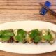Plat japonais-breton "Galetaki chou-fleur, petit pois, iburigakko, tomme à l’ail des ours, clémentine " du menu de printemps du restaurant Maison Chaya